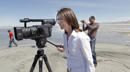 Al Hartmann  |  The Salt Lake Tribune
Shirley Erickson Gorospe has made a documentary about a state plan to lease thousands of acres of the Great Salt Lake to a mineral company that plans to build a series of dikes to help harvest minerals. Gorospe wants to stop the project and spent her own money to make the documentary she released on YouTube.  She films with her husband Archie and son Eric near Salt Air on Monday April 16.