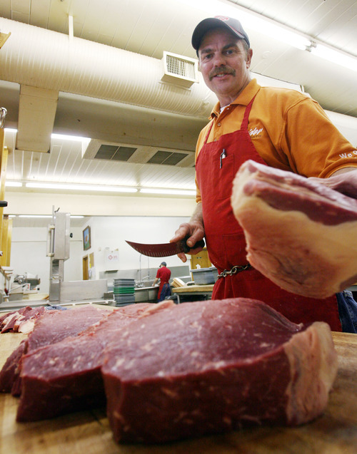 Steve Griffin/The Salt Lake Tribune


Will Wilson, a fifth-generation meat cutter, cuts meat at Snider's Brotherss Meats in Holladay, Utah Thursday April 12, 2012. WIlson as run the store since it opened in 1992.