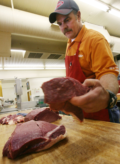 Steve Griffin/The Salt Lake Tribune


Will Wilson, a fifth-generation meat cutter, cuts meat at Snider's Brotherss Meats in Holladay, Utah Thursday April 12, 2012. WIlson as run the store since it opened in 1992.
