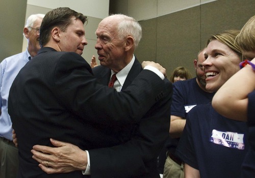 Leah Hogsten  |  The Salt Lake Tribune
Former state Sen. Dan Liljenquist gets a big hug from his father John Liljenquist while thanking his friends, staff and supporters after learning that he and Sen. Orrin Hatch will face a primary election. Hatch came up just short of the support needed to claim his party's nomination for the seventh time, forcing him into a primary election in June. After two rounds of balloting, Hatch had the support of 59.1 percent, a handful of votes short of the 60 percent threshold to claim the nomination outright.The Utah Republican Party held its nominating convention Saturday, April 21 2012 in Sandy at the South Towne Exposition Center.