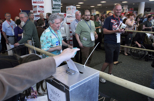 Francisco Kjolseth  |  The Salt Lake Tribune
Democrats line up to cast their votes as the state party nominating convention Saturday at the Calvin L. Rampton Salt Palace Convention Center.