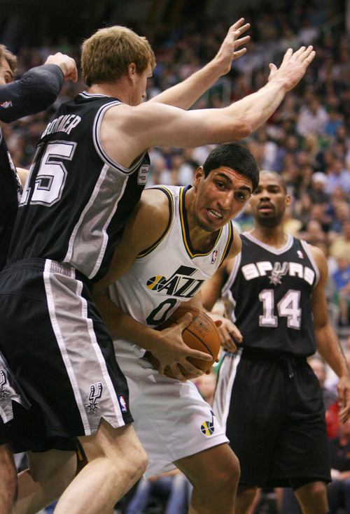 Steve Griffin/The Salt Lake Tribune


Utah's Enes Kanter pushes into San Antonio's Matt Bonner as he looks for room under the basket during first half action in the Jazz versus Spurs game at EnergySolutions Arena in Salt Lake City Monday April 9, 2012.