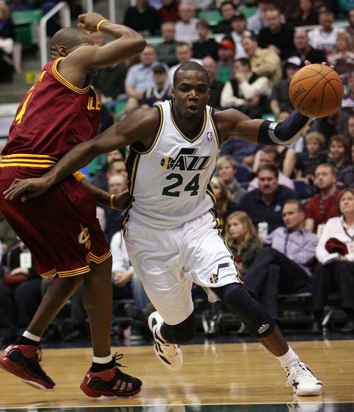 Steve Griffin  |  The Salt Lake Tribune

Utah's Paul Millsap drives around Cleveland's Antawn Jamison during first half action in the Jazz Cleveland game at EnergySolutions Arena in Salt Lake City, Utah  Tuesday, January 10, 2012.