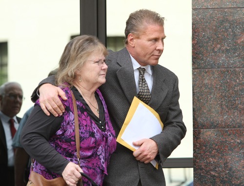 Rick Egan  | The Salt Lake Tribune 

Joseph Berg leaves the 4th District Court, with his mother, after his sentencing hearing, Monday, April 23, 2012. Berg is a plastic surgeon who pleaded guilty to kidnapping, drug and weapons charges for an episode where he kidnapped his girlfriend.