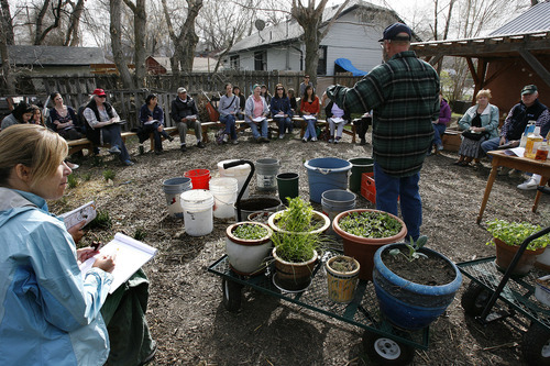 Scott Sommerdorf  |  The Salt Lake Tribune             
Urban homesteader Jonathan Krausert teaches a class on how to grow vegetables and flowers in colorful containers, at Wasatch Community Garden, Saturday, March 24, 2012. The session was structured mostly as a question-answer format.