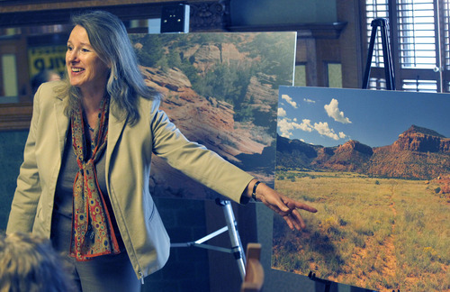 Al Hartmann  |  The Salt Lake Tribune
Heidi McIntosh, associate director and counsel for the Southern Utah Wilderness Alliance, speaks at a news conference Tuesday, April 24, about the state of Utah's claim to thousands of dirt roads throughout the state.    The map at left shows a red maze of over 25,000 highway rights of way sought by the state.   SUWA and other conservation and recreation groups contend the case is about wilderness, not transportation.