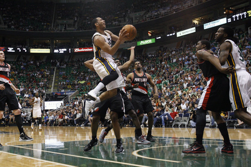 Chris Detrick  |  The Salt Lake Tribune
Utah Jazz point guard Devin Harris (5) shoots the ball during the first quarter of the game at EnergySolutions Arena Thursday April 26, 2012. The Jazz are winning the game 23-16.