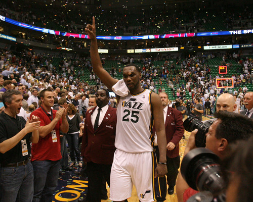 Steve Griffin/The Salt Lake Tribune


With a bandage on his head, Utah's Al Jefferson points to the sky as he walks off the court Tuesday after powering the Jazz to a victory over Phoenix and into the playoffs.