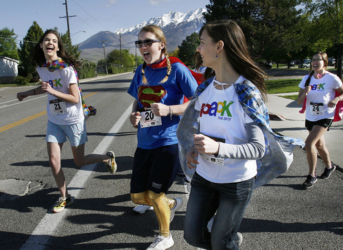 Scott Sommerdorf  |  The Salt Lake Tribune             
A group of spirited runners from Timpview High competes in the inaugural Shriners Hospital for Children 5K and 10K run Saturday, April 28, 2012. The run helps to raise money for children born with orthopaedic and neuromusculoskeletal disorders.