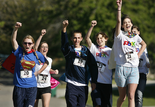 Scott Sommerdorf  |  The Salt Lake Tribune             
A group of spirited runners from Timpview High competes in the inaugural Shriners Hospital for Children 5K and 10K run Saturday, April 28, 2012.