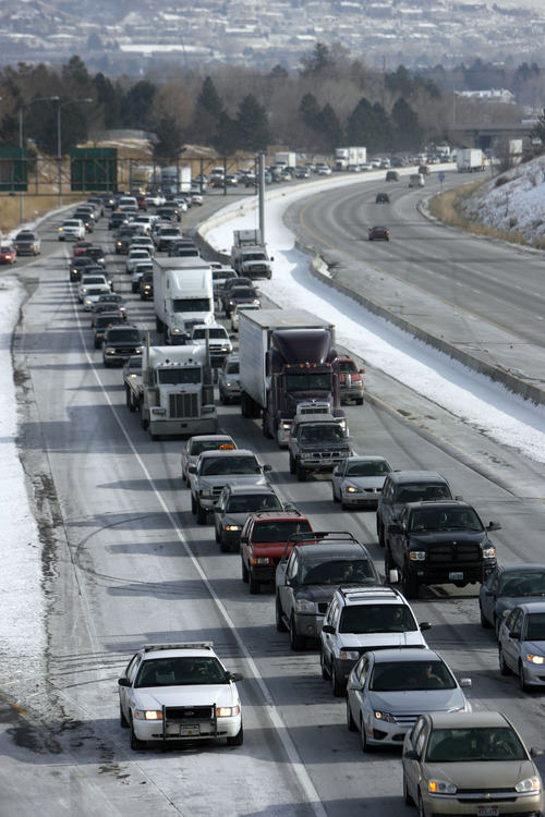 Tribune file photo  
Mobile sources such as cars and trucks contribute nearly half of the PM2.5 pollution in northern Utah -- leading some to suggest reduced speed limits on bad air days and a push for greater use of mass transit, perhaps through free-fare days.