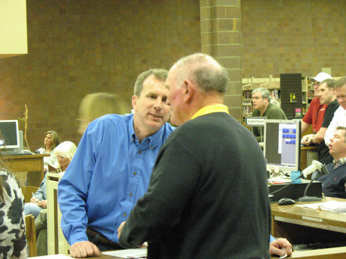 Donald W. Meyers | Tribune file photo
State Rep. Chris Herrod, R-Provo, speaks with a participant in the Provo Precinct 16 caucus at Timpview High School on March 15.
Herrod is seeking to unseat U.S. Sen. Orrin Hatch for the Republican nomination.