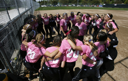 Francisco Kjolseth  |  The Salt Lake Tribune
Pleasant Grove players show their support for former teammate and now assistant coach Jade Kennedy as they all wear her old #20 after she was diagnosed with thyroid cancer three weeks ago. Softball players from a number of schools took each other on at the Big Cottonwood Regional Park compex on Saturday, April 28, 2012, as part of Swing for Life, which raises money for breast cancer research.