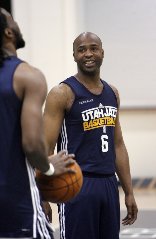 Francisco Kjolseth  |  The Salt Lake Tribune
Utah Jazz guard Jamaal Tinsley has a little fun with teammates prior to practice on Tuesday, May 2, 2012, at the Zions Bank Basketball Center. The Utah Jazz are getting ready for round two of the playoffs against San Antonio with much of their work hindering on their ability to defend Tony Parker of the Spurs.