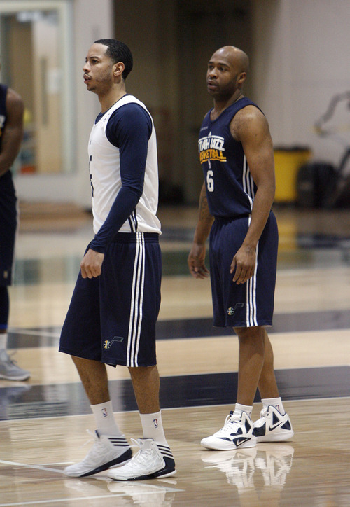 Francisco Kjolseth  |  The Salt Lake Tribune
Utah point guard Devin Harris, left, and Jamaal Tinsley join the team for practice on Tuesday, May 1, 2012 as the Utah Jazz get ready for round two of the playoffs against San Antonio at the Zions Bank Basketball Center. Much of their work hinders on their ability to defend Tony Parker of the Spurs.
