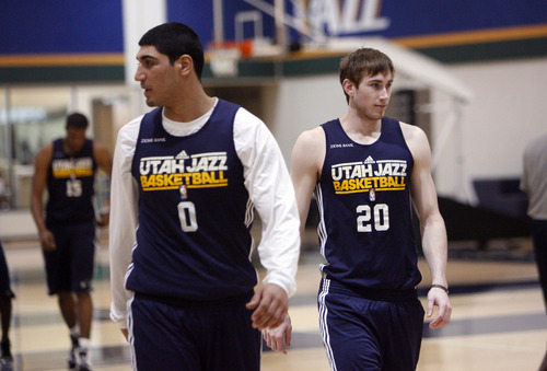 Francisco Kjolseth  |  The Salt Lake Tribune
Utah players Enes Kanter, left, and Gordon Hayward head in to review tape prior to practice on Tuesday, May 2, 2012, at the Zions Bank Basketball Center. The Utah Jazz are getting ready for round two of the playoffs against San Antonio with much of their work hindering on their ability to defend Tony Parker of the Spurs.