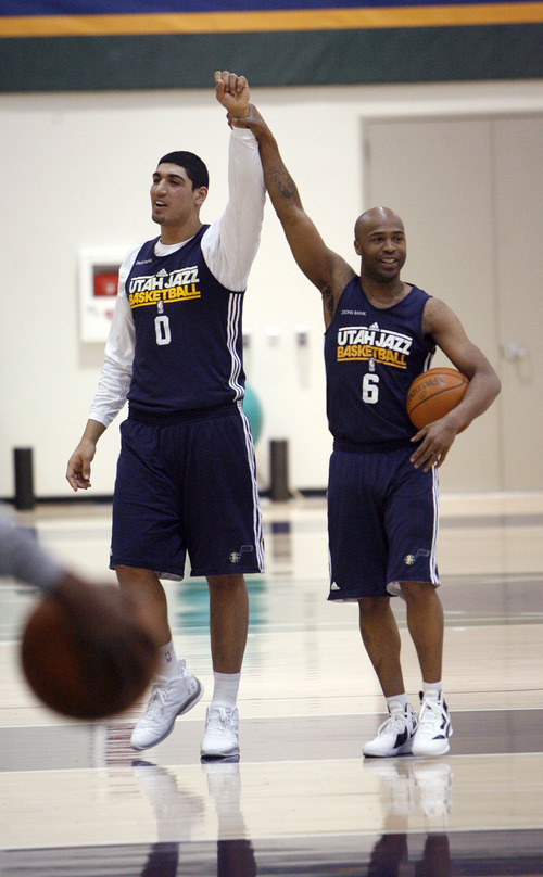 Francisco Kjolseth  |  The Salt Lake Tribune
Utah Jazz guard Jamaal Tinsley, right, has a little fun with teammate Enes Kanter prior to practice on Tuesday, May 2, 2012, at the Zions Bank Basketball Center. The Utah Jazz are getting ready for round two of the playoffs against San Antonio with much of their work hindering on their ability to defend Tony Parker of the Spurs.