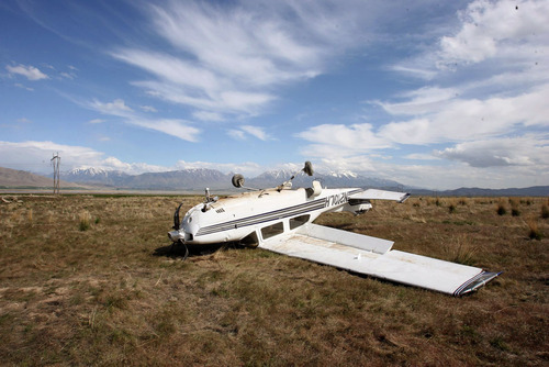 Steve Griffin  |  The Salt Lake Tribune

A plane crashed Tuesday near Elberta. The pilot and passenger both survived the crash.