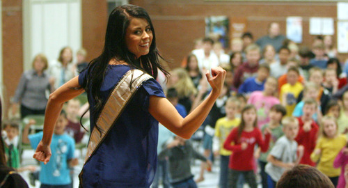 Steve Griffin/The Salt Lake Tribune


Kendyl Bell, 2012 Miss Utah USA, didn't find out she had asthma untll she was 17 so created Blue Balloon Day to encourage environments where everyone can breath clean air and have healthy lungs. In conjunction with World Asthma Day,  Bell talked with students at Scera Park Elementary, about asthma, during assembly  in Orem, Utah Tuesday May 1, 2012. Here she instructs the students in a dance routine.
