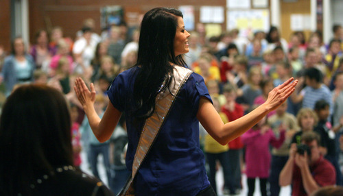 Steve Griffin/The Salt Lake Tribune


Kendyl Bell, 2012 Miss Utah USA, didn't find out she had asthma untll she was 17 so created Blue Balloon Day to encourage environments where everyone can breath clean air and have healthy lungs. In conjunction with World Asthma Day,  Bell talked with students at Scera Park Elementary, about asthma, during assembly  in Orem, Utah Tuesday May 1, 2012. Here she instructs the students in a dance routine.