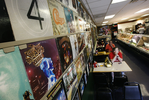 Scott Sommerdorf  |  The Salt Lake Tribune             
Pop On Over Cafe in South Jordan has vintage album covers covering the walls. Customers can also look through the available record collection, and spin an album of their choice on the restaurant's turntable.