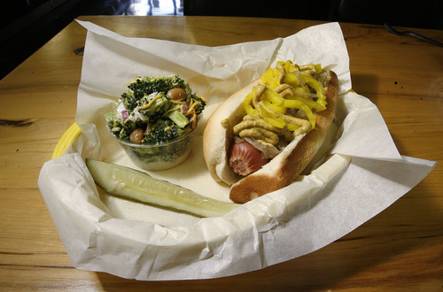 Scott Sommerdorf  |  The Salt Lake Tribune             
The Sabrett Hot Dog ($3.50) with 100 percent Kobe beef, served on a warm, soft roll topped with your choice of a pungent sauerkraut, onions, peppers or pickles and a side of chips.
