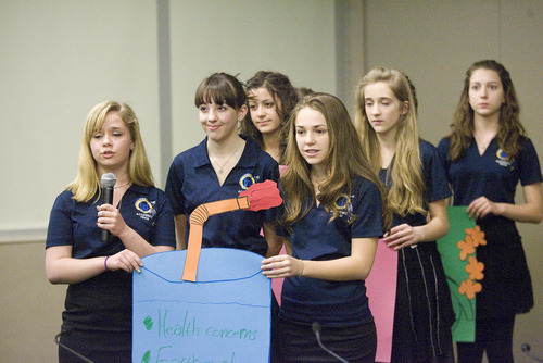 Paul Fraughton | The Salt Lake Tribune.
Members of Wasatch Junior High's Academic  Presentation  Team   give their presentation on the pros and cons of hydraulic fracturing, part of the competition at the National Academic League tournament. The championship was held, via web conferencing,  with a team from North Carolina. Wasatch defended their championship from last year's contest against the same school.  Friday, April 13, 2012