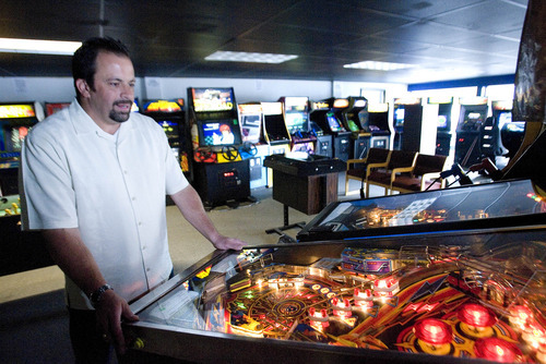 Paul Fraughton  |  The Salt Lake Tribune
A frequent customer at the Atomic Arcade, Larry Schmidt plays a pinball machine.