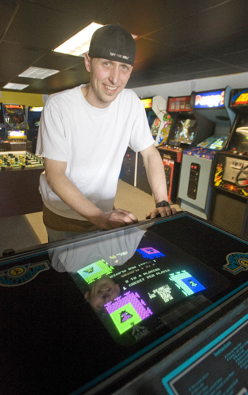 Paul Fraughton  |  The Salt Lake Tribune
Chris Wright opened Atomic Arcade, which is filled with games from the glory days of video game arcades, in March. 