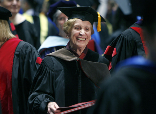 Francisco Kjolseth  |  The Salt Lake Tribune
Beverley Taylor Sorenson holds her honorary degree awarded in consideration of her dedication to promoting the importance of arts as an essential part of a child's education. She received the honor at commencement ceremonies at the Huntsman Center in Salt Lake City on Friday, May 4, 2012.