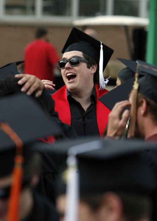 Francisco Kjolseth  |  The Salt Lake Tribune
Blake Barcus tries to motivate fellow soon-to-be graduates to join him in the University of Utah chant before commencement ceremonies at the Huntsman Center in Salt Lake City on Friday, May 4, 2012.