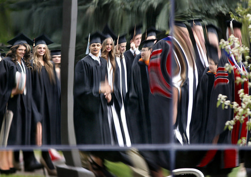 Scott Sommerdorf  |  The Salt Lake Tribune             
Distorted reflections of USU students in the processional to Utah State University's Commencement ceremony, Saturday, May 5, 2012.