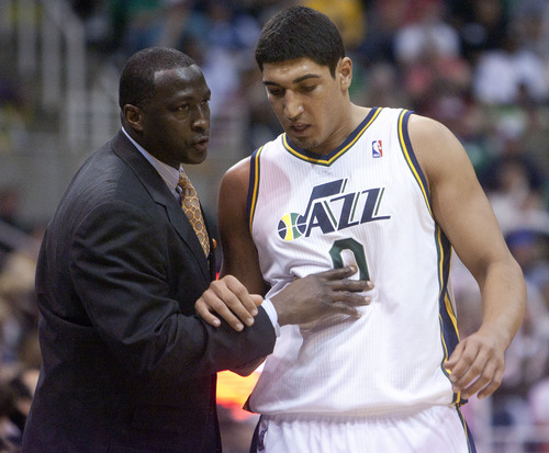 Jeremy Harmon  |  The Salt Lake Tribune

Ty Corbin talks with Enes Kanter on the sidelines as the Jazz host the Spurs in the first round of the NBA playoffs at EnergySolutions Arena in Salt Lake City, Saturday, May 5, 2012.