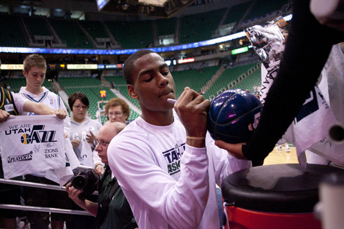 Jeremy Harmon  |  The Salt Lake Tribune

Utah's Alec Burks signs autographs for fans before the Jazz face the Spurs in game 3 of the of the first round of the NBA playoffs at EnergySolutions Arena in Salt Lake City, Saturday, May 5, 2012.