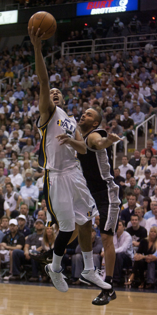 Jeremy Harmon  |  The Salt Lake Tribune

Devin Harris drives past Tony Parker as the Jazz host the Spurs in the first round of the NBA playoffs at EnergySolutions Arena in Salt Lake City, Saturday, May 5, 2012.