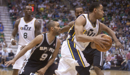 Jeremy Harmon  |  The Salt Lake Tribune

Devin Harris drives around Tony Parker and Kawhi Leonard as the Jazz host the Spurs in the first round of the NBA playoffs at EnergySolutions Arena in Salt Lake City, Saturday, May 5, 2012.