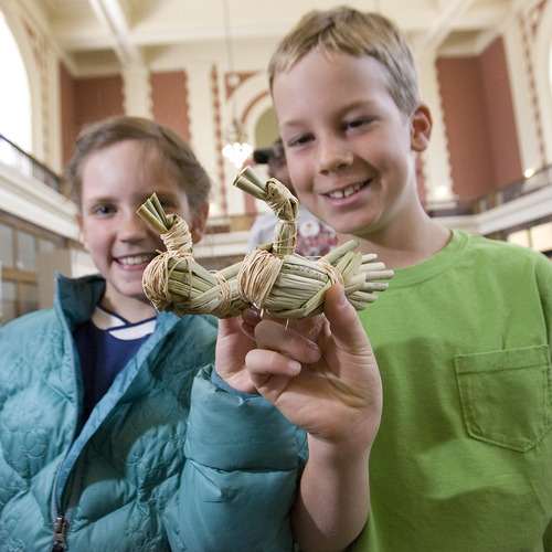 Paul Fraughton | Salt Lake Tribune
Gabriella Zipek, 10,  and Tristam Gaylord, 10, show off the duck decoys they made from tule reeds at the archaeology open house Saturday at the Utah  State History Museum at the Rio Grande Depot. The event, part of Archaeology Week activities, began Saturday and will run through May 12th.  At the open house, children participated in hands on activities with a  archaeological theme.
 Saturday, May 5, 2012