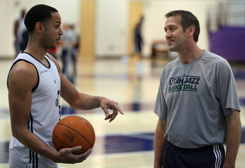 Lennie Mahler  |  The Salt Lake Tribune
Devin Harris speaks with Jeff Hornacek during a practice at the Zions Bank Basketball Center on Sunday, May 6, 2012.