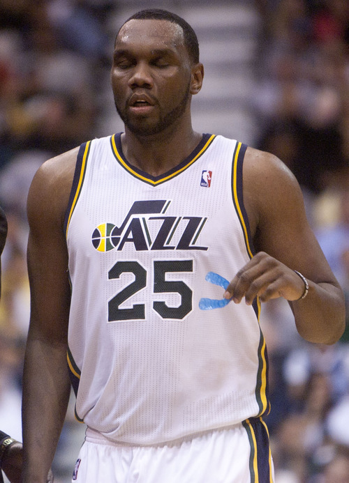 Jeremy Harmon  |  The Salt Lake Tribune

Al Jefferson leaves the court as the Jazz host the Spurs in the first round of the NBA playoffs at EnergySolutions Arena in Salt Lake City, Saturday, May 5, 2012.