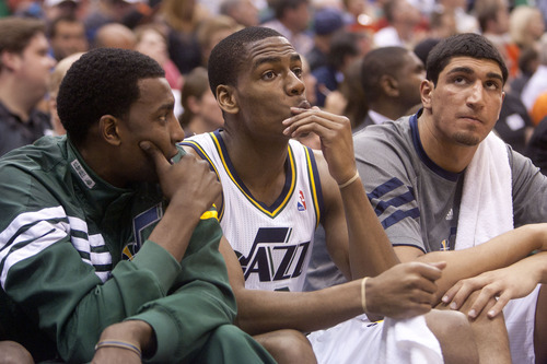 Jeremy Harmon  |  The Salt Lake Tribune

Jeremy Evans, Alec Burks and Enes Kanter watch as the Jazz fall behind in the second half as Utah hosts the Spurs in the first round of the NBA playoffs at EnergySolutions Arena in Salt Lake City, Saturday, May 5, 2012.