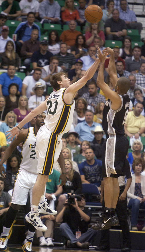 Jeremy Harmon  |  The Salt Lake Tribune

Gordon Hayward tries to block a shot from Tony Parker as the Jazz host the Spurs in the first round of the NBA playoffs at EnergySolutions Arena in Salt Lake City, Saturday, May 5, 2012.