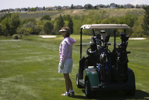 Kim Raff | The Salt Lake Tribune
Gail Winterfeld plays golf at Hidden Valley Country Club in Sandy on Sunday, May 6, 2012. Gail Winterfeld is the top fundraiser for the Utah chapter of the Susan G. Komen Foundation, which this year is seeing a drop in registrations for the May 12 Race for the Cure event held around the country due to the Planned Parenthood controversy. Gail, who had breast cancer, will walk the 5K course and plays golf to stay in shape.