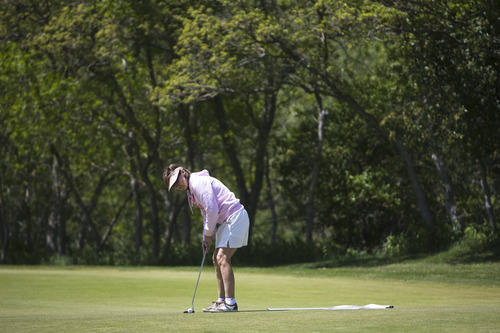 Kim Raff | The Salt Lake Tribune
Gail Winterfeld plays golf at Hidden Valley Country Club in Sandy on Sunday, May 6, 2012. Gail Winterfeld is the top fundraiser for the Utah chapter of the Susan G. Komen Foundation, which this year is seeing a drop in registrations for the May 12 Race for the Cure event held around the country due to the Planned Parenthood controversy. Gail, who had breast cancer, will walk the 5K course and plays golf to stay in shape.
