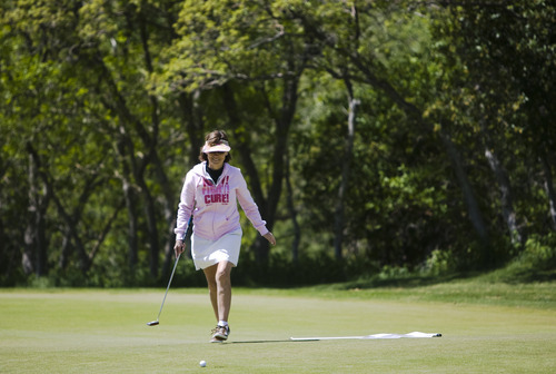 Kim Raff | The Salt Lake Tribune
Gail Winterfeld plays golf at Hidden Valley Country Club in Sandy on Sunday, May 6, 2012. Gail Winterfeld is the top fundraiser for the Utah chapter of the Susan G. Komen Foundation, which this year is seeing a drop in registrations for the May 12 Race for the Cure event held around the country due to the Planned Parenthood controversy. Gail, who had breast cancer, will walk the 5K course and plays golf to stay in shape.
