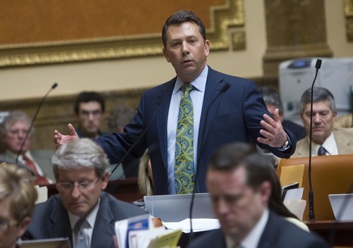 AL HARTMANN  |  The Salt Lake Tribune 
Rep. Stephen Sandstrom, R-Orem, stands Friday for the two-hour debate over his enforcement-only immigration bill. The measure, after being amended for the second time in two weeks passed the House overwhelmingly, 58-15. It now goes to the Senate.