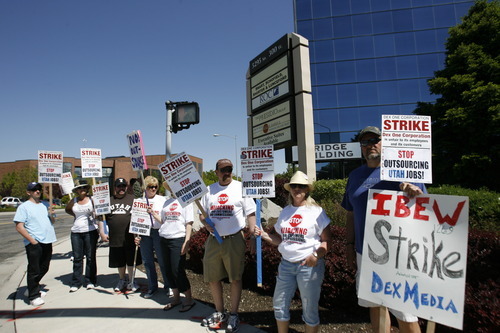Paul Fraughton | Salt Lake Tribune
Picketers from IBEW  local 1269 strike against Dex One Corp. in Salt Lake on Tuesday, May 8, 2012.