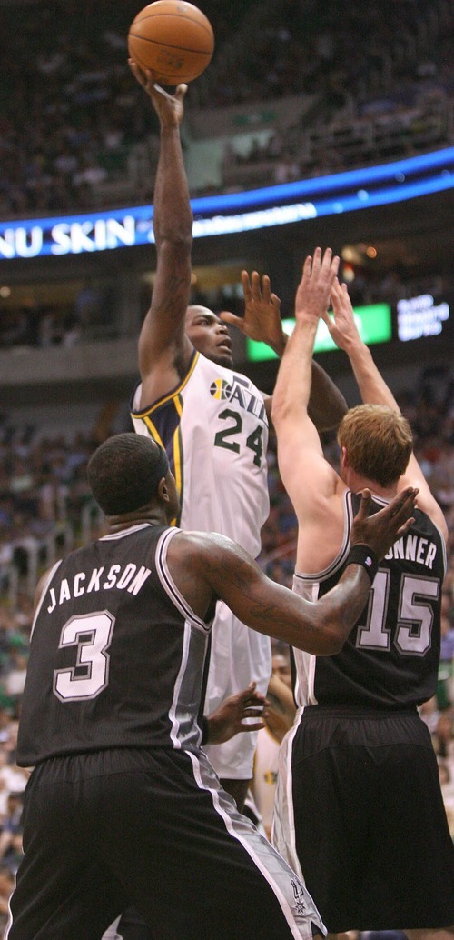 Paul Fraughton / Salt Lake Tribune
Paul Millsap goes up for the shot against SanAntonio's Matt Bonner. The Utah Jazz played the San Antonio Spurs in game 4 of the  first round of the playoffs at Energy Solutions Arena.
 Monday, May 7, 2012