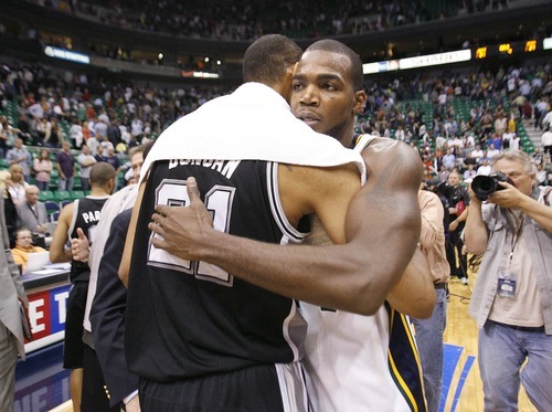 Paul Fraughton / Salt Lake Tribune
After the game Tim Duncan and Paul Millsap  embrace.The Utah Jazz played the San Antonio Spurs in game 4 of the  first round of the playoffs at Energy Solutions Arena.
 Monday, May 7, 2012
