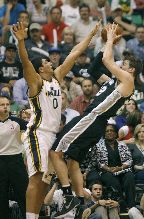 Paul Fraughton / Salt Lake Tribune
Utah's Enes Kanter is whistled for the foul on San Antonio's Tiago Splitter. The Utah Jazz played the San Antonio Spurs in game 4 of the  first round of the playoffs at Energy Solutions Arena.
 Monday, May 7, 2012