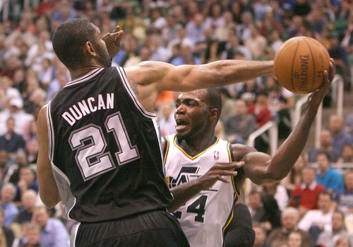 Paul Fraughton | Salt Lake Tribune
Paul Millsap looks for the pass as San Antonio's Tim Duncan defends in game 4 of the  first round of the playoffs at Energy Solutions Arena in Salt Lake City on Monday, May 7, 2012.